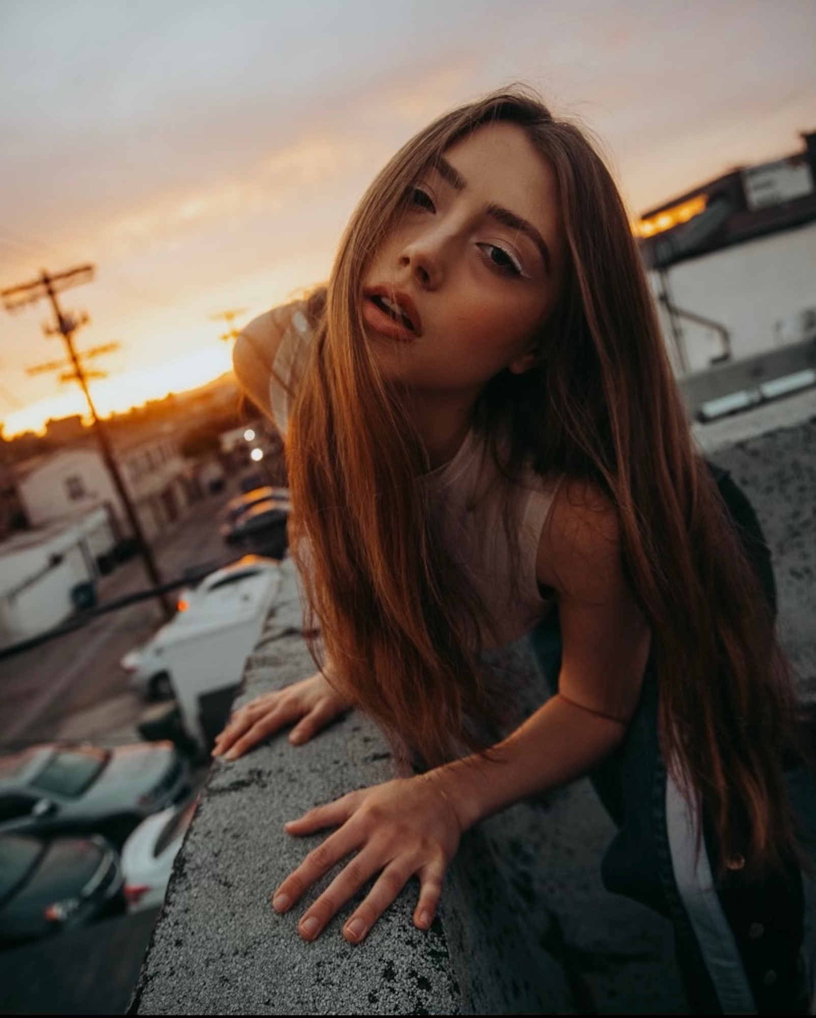 Baker Grace rooftop portrait at sunset